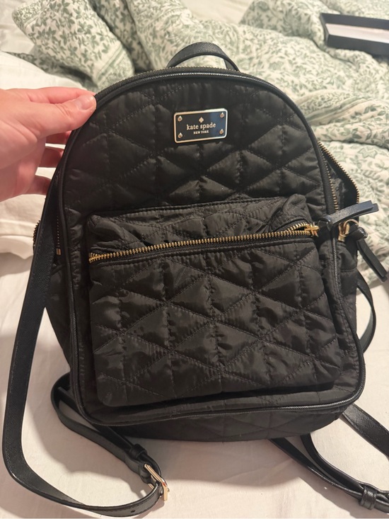 kate spade Handbags - kate spade Black Quilted Mini Backpack with Gold Hardware